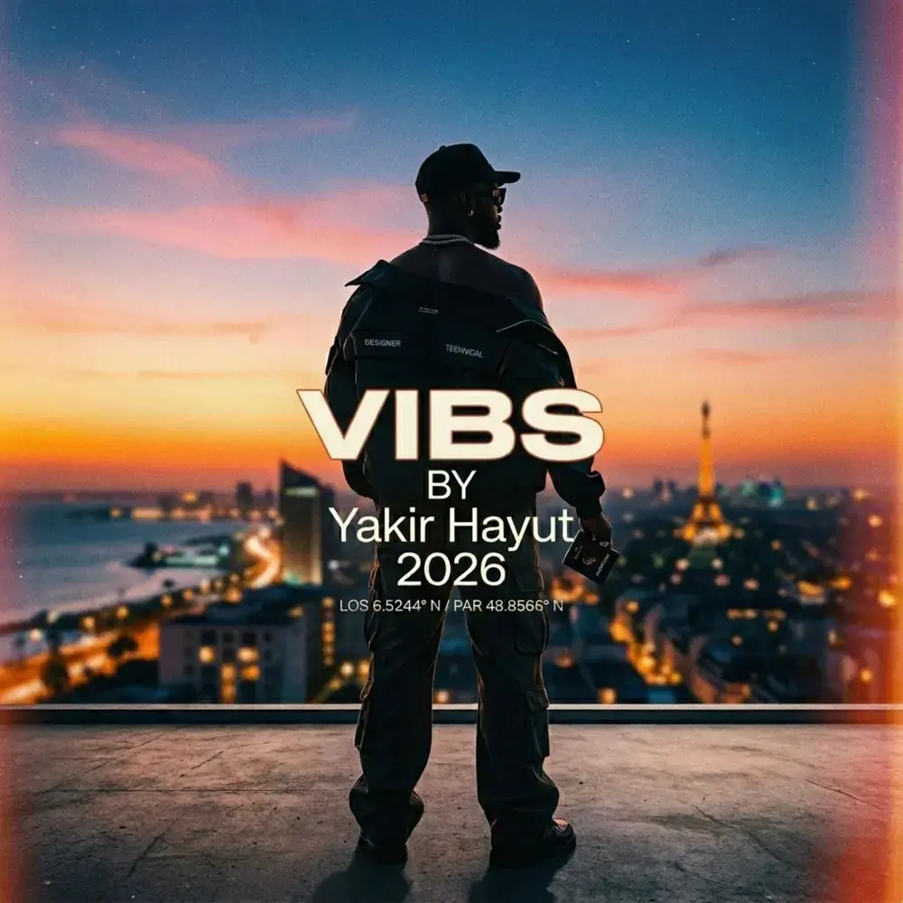 Vibs, אפריל 2026 עטיפת הסינגל Vibs של יקיר חיוט: דמות על גג בשקיעה מול עיר מוארת